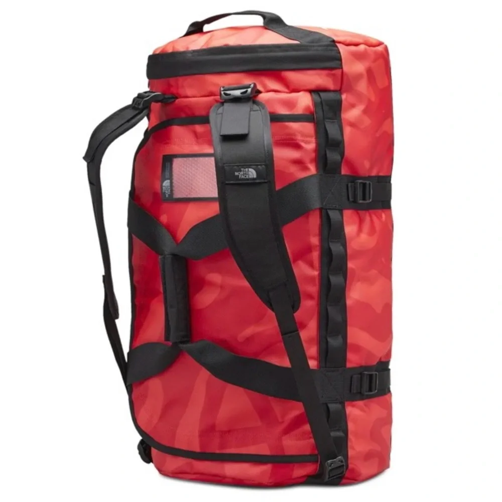 NWT 2022 KAWS x THE NORTH FACE MEDIUM RED DUFFLE BAG BRILLIANT CORAL 86 PRINT